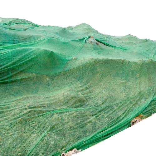 La función de la red de prevención de polvo en el sitio de construcción.